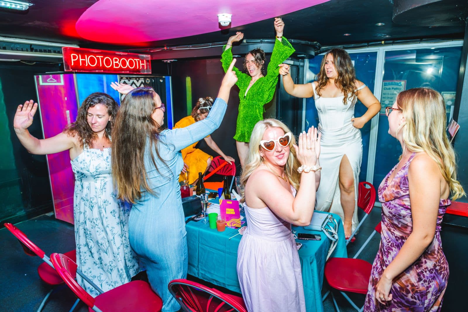 Guests dancing by the photobooth